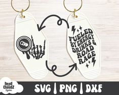 two white tags with black ink on them and the words svg png dxf