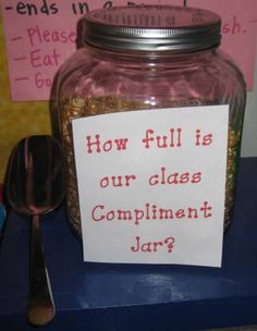 a jar with a sign on it that says how full is our class compliment jar?