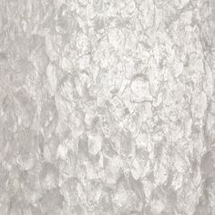 an abstract textured wallpaper with white and gray colors is seen in this image