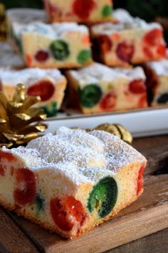 a piece of cake sitting on top of a wooden cutting board