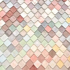 an image of a colorful mosaic tile pattern that looks like it is made out of different colors