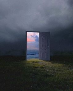 an open door in the middle of a field