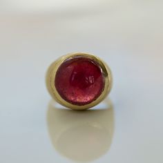 This stunning pigeon red ruby cabochon is the perfect statement ring. A 3.87 cts of ruby is set in a bezel that is polished and the rest of the ring has a satin finish. Definitely a stunner. One of a kind ring DETAILS: 14KY gold 3.87 cts ruby cabochon Size: 7 Luxury Women's Oval Cabochon Ruby Ring, Cabochon Ring, Bespoke Jewellery, Domed Ring, Red Ruby, Custom Jewelry Design, Ruby Ring, Jewelry Inspo, Pigeon