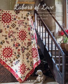 the cover of labor's of love, featuring an antique quilt on a stair case