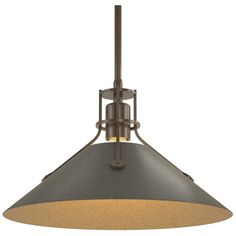 a light fixture with an iron finish and a brown shade on the bottom, hanging from a