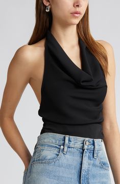 Softly draped in front and cut daringly low in back, this halter top stuns whether you're coming or going. 18" center front length (size Medium) Halter neck Ties at neck Cowl neck 100% polyester Machine wash, tumble dry Imported Halter Neck Tie Top, Black Halter Neck Top Outfit, Black Fitted Top Outfit, Cowl Neck Shirt Outfit, Low Cut Top Outfit, Black Top Outfit Ideas, Halter Neck Outfit, Halter Top Outfit Ideas, Jeans And Top Outfit