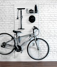 there is a bike hanging on the wall