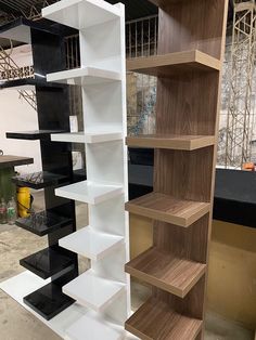 the shelves are stacked high and ready to be put into place in the shop or office