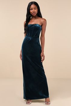 You'll command the room with an impressive look like the Lulus Regal Affect Teal Blue Velvet Bustier Strapless Maxi Dress! Luxe, stretchy velour velvet shapes this sensational dress with a flattering straight neckline (with hidden no-slip strips) and a strapless, bustier-style bodice with supportive boning. Basque waist sits atop a figure-skimming column skirt that falls to an elegant maxi hem with a kick pleat at the back for movement. Hidden back zipper/clasp. Fit: This garment fits true to si Velvet Dress Strapless, Strapless Velvet Evening Dress, Fitted Strapless Velvet Dress, Strapless Velvet Maxi Dress, Glamorous Velvet Strapless Dress, Velvet Bustier, Strapless Bustier, Column Skirt, Velvet Maxi Dress