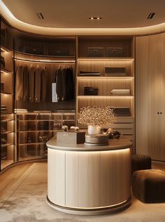 a walk in closet with a circular counter