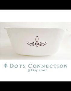 a white bowl with an ornate design on the side and words dot's connection