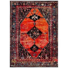 an orange, black and red rug with many different designs on the bottom half of it