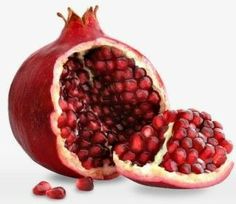 the pomegranate is cut in half and ready to be used as a garnish