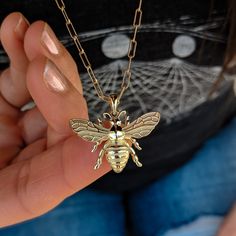 This bestseller solid gold diamond bee pendant was designed with love and painstaking detail, she is delicate and animated. A dual high polish and sandblasted finish brings out the bumblebee's signature features, while sparkling diamond eyes add elegance and style. Prefer colored gemstones in place of diamonds, or a larger or smaller size? This pendant is fully customizable, so contact us for a quote if you want it in different size, gemstones or mixed metals. Details: - Made to order at our fam Platinum Chain, Bee Pendant, Gold Bee, Diamond Eyes, Bee Necklace, Custom Pendants, Star Jewelry, Sparkle Diamonds, Yellow Rose