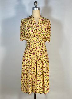 Live your best Summer life in this dreamy Berries & Cherries print, on sunny yellow, rayon dress circa late 30's! I adore the incredible and idyllic print on this fabulous vintage dress -how could you not? Featuring the Summer-iest of prints, this lightweight dress is perfect for hotter weather. It's made of a super soft rayon weave fabric, with a light sunny yellow ground, and juicy berry & cherry print in green and pink-red hues, with black and white shadows and highlights. It's meant to have a somewhat loose and casual fit and flare silhouette, with v-neckline, short sleeves and fairly straight-cut skirt. There are wonderful, non-obvious details in the gathering and shirring, at shoulders, upper waist and through the center waistline decorative stitching. There is a side button closure Summer Life, Weave Fabric, Sunny Yellow, Rayon Dress, Lightweight Dress, Cherry Print, Hot Weather, The Gathering, Vintage Dress