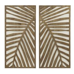 two wooden panels with palm leaves cut out on the sides, one is white and the other is brown