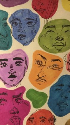 a drawing of many different faces on a piece of paper