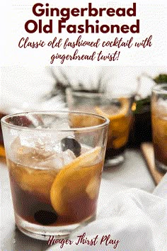 an old fashioned cocktail is garnished with orange peels and gingerbread syrup