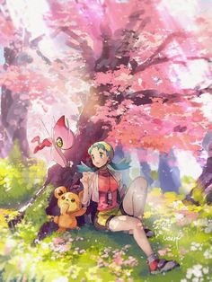 a woman sitting on the ground next to a tree with pink flowers and a stuffed animal