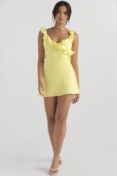 FeaturesAnd what could be sexier and more chic than our Yellow Silk Satin Ruffle Mini Dress. A delicate neckline. romantic ruffles all over the left half. and a wide open back make it our prettiest dress to date. Crafted from our ultra-luxe. lightweight silky satin with a bright yellow hue. this piece is specially tailored for a beautiful drape and flowy feel. A zipper on the back makes it easy to put on and take off. and a full lining ensures a comfortable fit. Size Chart US UK EU AU XS 2 6 34 Sleeveless Skirt, Cutout Maxi Dress, Yellow Silk, Half Skirt, Mode Chic, Ruffle Mini Dress, Body Con Skirt, Hoco Dresses, Homecoming Dress