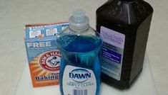 a bottle of detergent, dish soap and baking soda on a counter