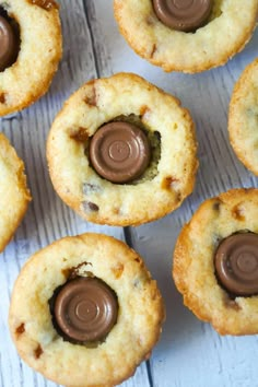 several cookies with chocolate in them sitting on a table