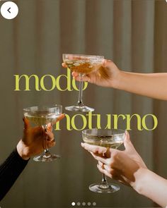 three people holding up wine glasses with the words model noturno