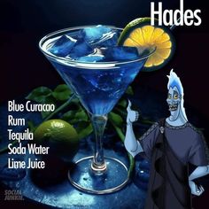 an image of a blue curaco cocktail with limes