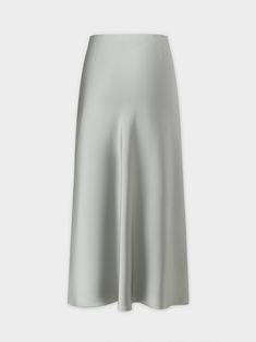 Discover comfort and elegance with our Satin Slip Skirt in Sage. Perfect for any occasion, this skirt is both stylish and comfortable for any occasion. Silk Skirt With Bias Cut And Relaxed Fit, Sleek Evening Skirt For Spring, Satin Midi Bottoms For Party, Satin Midi-length Bottoms For Party, Spring Satin Skirt For Night Out, Satin Midi-length Party Bottoms, Satin Party Bottoms Midi Length, Party Satin Bottoms Midi Length, Sleek Silk Midi Skirt