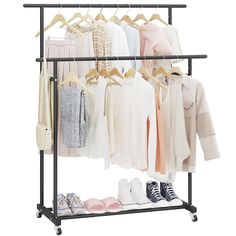 a rack with clothes and shoes on it