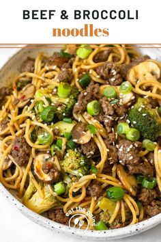 beef and broccoli noodles in a white bowl