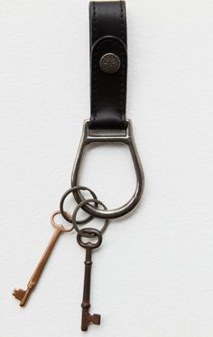 Keep your keys close with this so chic and functional keyring featured in a buttery soft leather and thin silhouette with stunning metal hardware and an oversized ring for all your essential keys. Oversized Ring, Style Gift, Beauty Accessories, Sedona, Metal Hardware, Skirt Pants, Soft Leather, Derby, Jumpsuit Dress