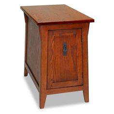 a small wooden cabinet with a door on the front and bottom shelf, sitting against a white background