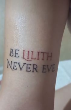 a woman with a tattoo on her leg that says be ruth never eve