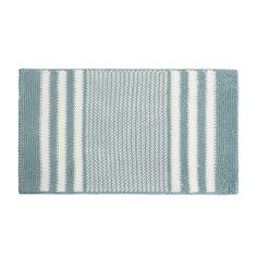 a blue and white striped rug on a white background