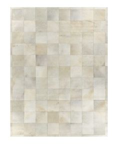 a white rug with squares on it