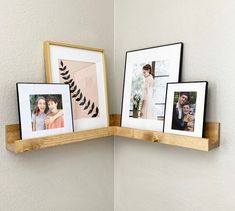 two wooden shelves with pictures on them and one shelf holding three framed photos in it