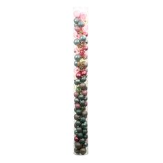 a tube filled with lots of different colored beads