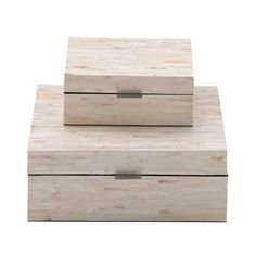 two wooden boxes sitting on top of each other