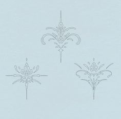 three fleur de lis are shown on a light blue background