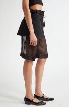 The maison masterfully blurs the lines between art and fashion with suiting-inspired shorts cut from sheer silk and boasting a pencil-style miniskirt overlay. 10" inseam; 24" leg opening; 14" front rise; 14" back rise (size 42IT) Drawstring waist Back button-welt pockets 60% polyester, 40% cotton with 100% silk contrast Dry clean Made in Italy Designer Clothing Modern Mini Bottoms For Summer, Modern Mini Length Bottoms For Summer, Chic Nylon Shorts For Summer, Chic Summer Nylon Shorts, Modern Mini-length Summer Bottoms, Modern Short Skirt For Summer, Modern Short Summer Skirt, Modern Skirt For Summer Night Out, Modern Mini Skort For Summer