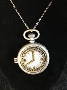 This pocket watch locket  is more simple than the other ones that I've made. If you like the steam punk idea but like a more simple version of it, then this one's for you!  Combined shipping available Watch Locket, Clock Necklace, Unique Hair Clip, Steampunk Pendant, Steam Punk Jewelry, Personalized Pendant, Steampunk Jewelry, Retirement Gift, Modern Necklaces