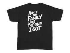 Celebrate your family bond with this stylish "Ain't No Family Like The One I Got" T-Shirt. Perfect for family gatherings, and casual outings, or as a thoughtful gift to show your love and appreciation for your family. This graphic tee combines comfort and a heartfelt message, making it a standout piece in any wardrobe. Product Features: Fabrication: Medium fabric (5.3 oz/yd² (180 g/m 100% cotton (fiber content may vary for different colors) Seams: Without side seams Fit: Classic Fit Sizing: Family Sizing Label: Tear-away label Black Cotton T-shirt For Family Outings, Black Graphic Print T-shirt For Family Outings, Relaxed Fit T-shirt With Text Print For Family Occasions, Funny Cotton T-shirt For Family Reunion, Cotton Graphic Print T-shirt For Family Reunion, Family Reunion Gifts, Family Unity, Reunion Gift, Family Love Quotes