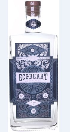 an empty glass bottle with a label on the front and side of it that says egbbertt