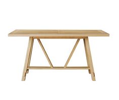 a wooden table on a white background with no people in the room to see it