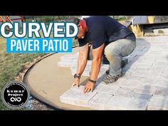 a man kneeling down on top of a cement slab with the words diy paver patio