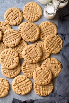 peanut butter cookies are arranged on a baking sheet