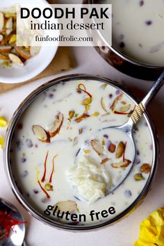 there is a bowl of food with milk and nuts on the table next to it