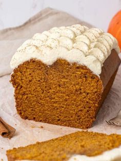 a loaf of pumpkin bread with white frosting