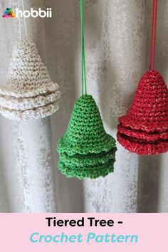 three crochet christmas tree ornaments hanging from strings with text overlay that reads, tiered tree - crochet pattern